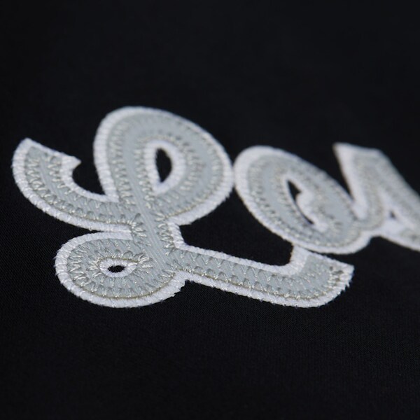 Women's Los Angeles Raiders Black Vintage Satin Full-Snap Jacket